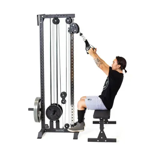 Cable Tower Plate Loaded for over 100 exercises, ideal for small home gyms in Vancouver; compact design with adjustable height settings.