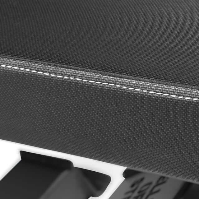 Close-up of BUZZ-SAW Heavy-Duty Adjustable Bench pad showing sturdy stitching for durability, available in Vancouver fitness stores.