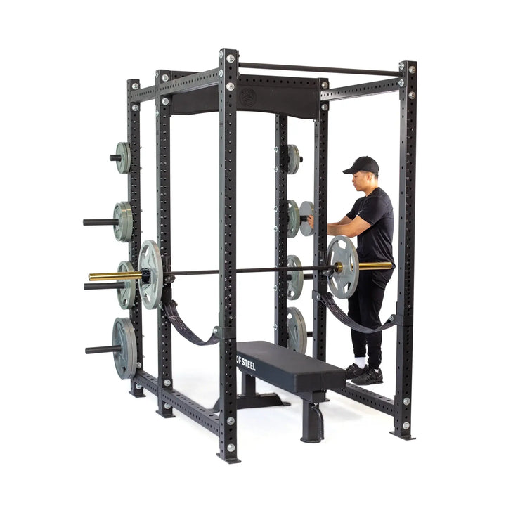 Hydra Six Post Power Rack with weights, ideal for home gyms in Vancouver, featuring 3"x3" frame and ⅝" holes for versatile workouts