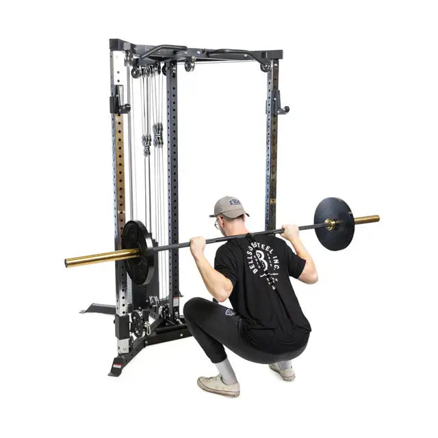 All-in-one trainer with user performing a squat, featuring multi-purpose machine ideal for home gyms and fitness equipment in Vancouver.