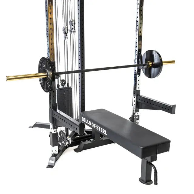 Compact all-in-one trainer with cable and barbell setup, ideal for home gyms in Vancouver; versatile fitness equipment.
