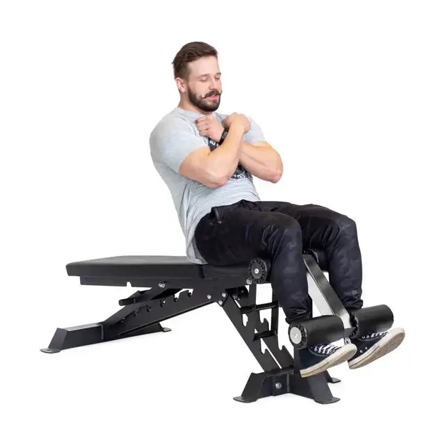 Man exercising on Buzz-Saw Heavy-Duty Adjustable Bench, fitness equipment available in Vancouver, ideal for home and commercial gyms.