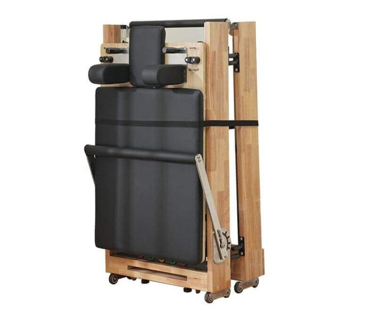 Folding Wooden Pilates Reformer for home gym; premium fitness equipment Vancouver, ideal for small spaces and apartment-friendly.