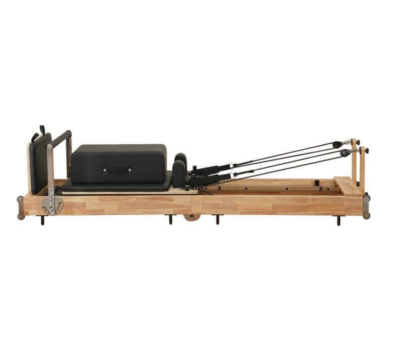 Folding wooden Pilates reformer bed for home gym, fitness equipment in Vancouver BC
