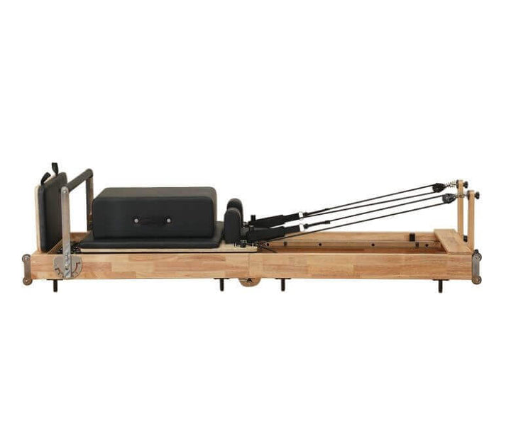 Folding wooden Pilates reformer bed for home gym, fitness equipment in Vancouver BC