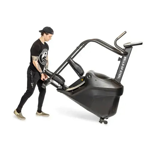 Man moving Bells of Steel fitness equipment, ideal for home gym workouts in Vancouver.
