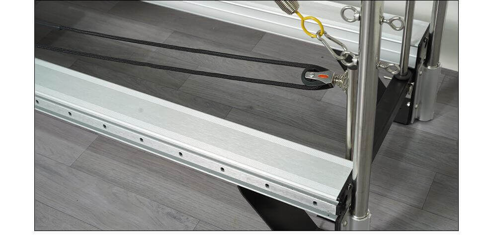Aluminum Alloy Pilates Reformer with Tower showcasing premium white aluminum structure, ideal for fitness equipment in Vancouver.